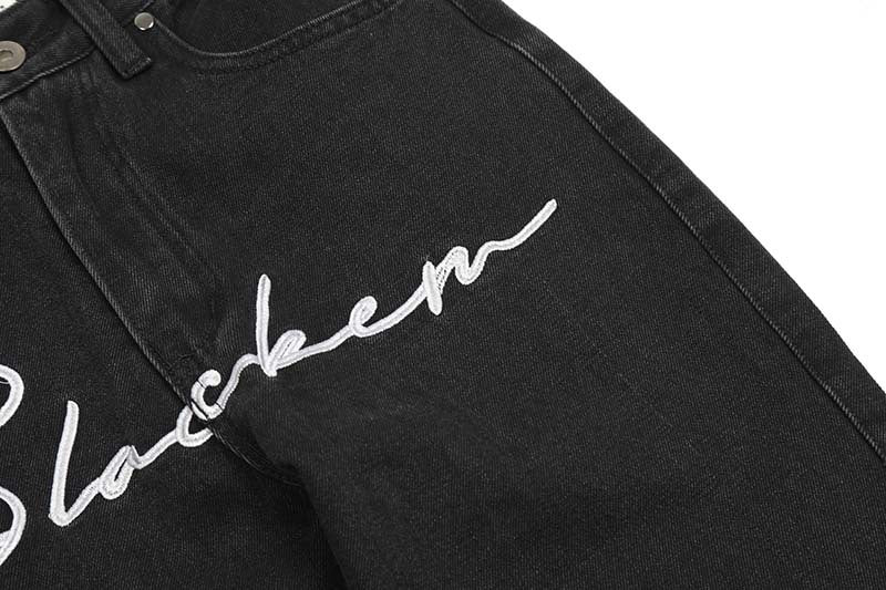 Ausgewaschene Baggy-Jeans mit Buchstaben